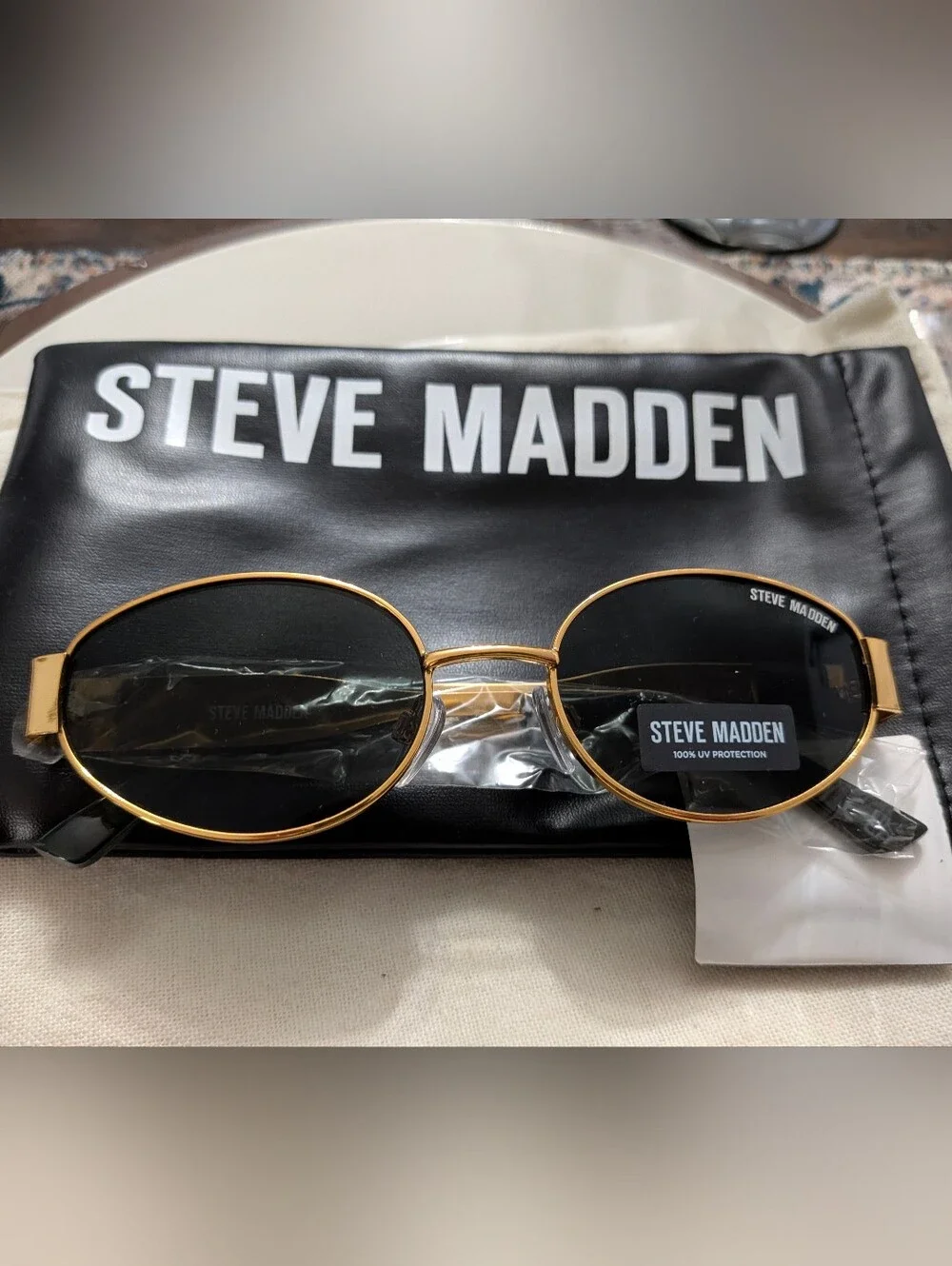 Steve Madden Gold Oval Sunglasses with Black Lenses